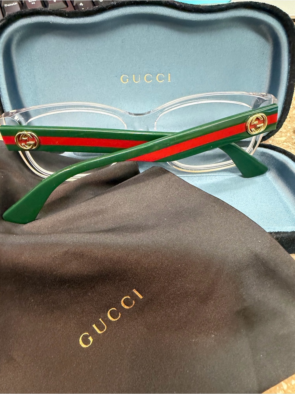 Gucci Clear Frame Glasses with Green and Red Stripe Temples